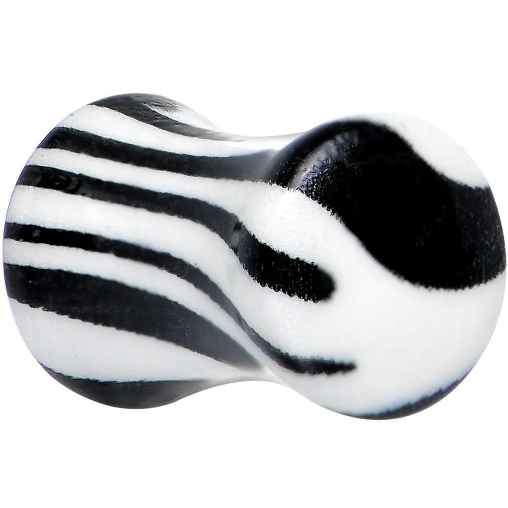 Zebra Print Glow in the Dark Saddle Plug 2 Gauge to 1 Inch