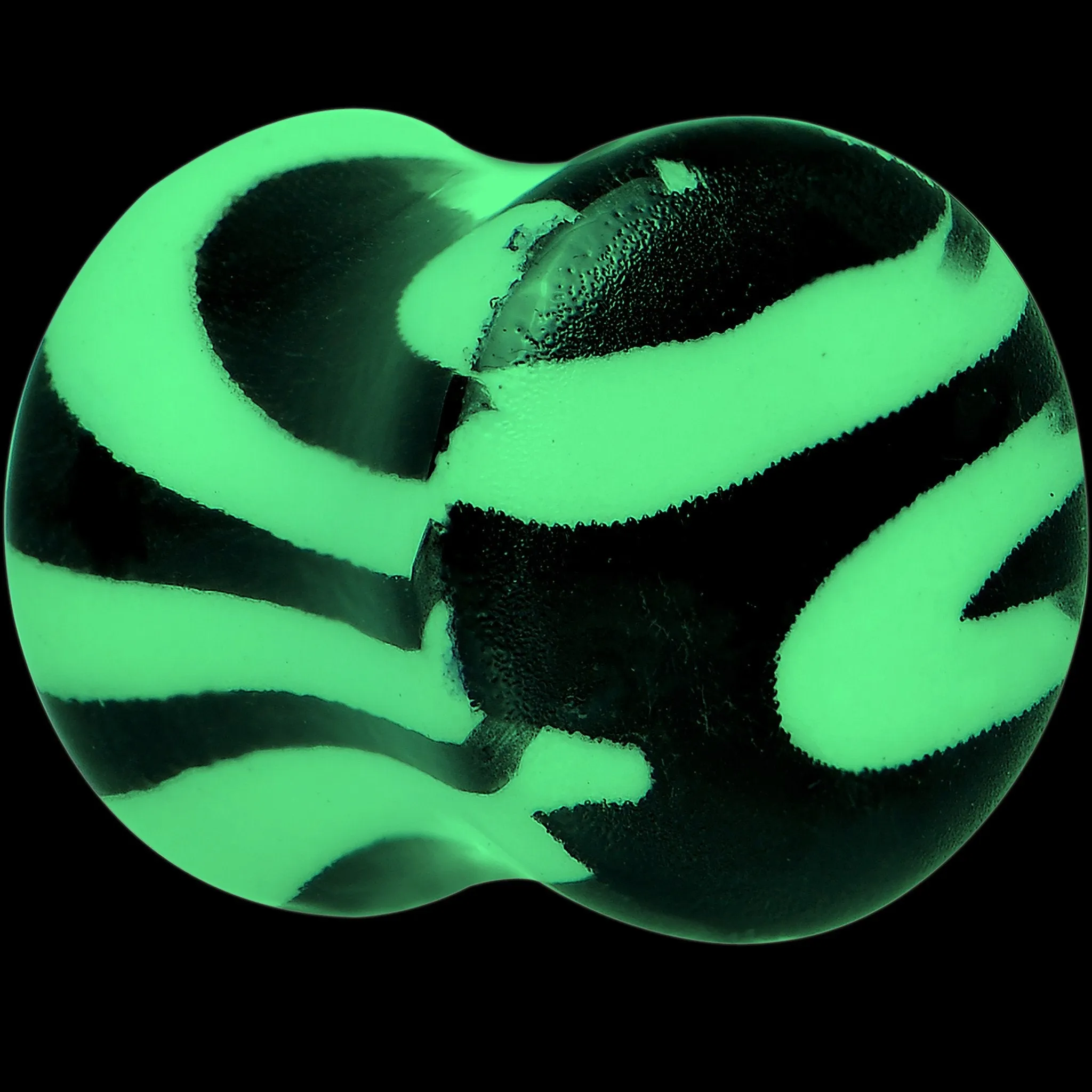Zebra Print Glow in the Dark Saddle Plug 2 Gauge to 1 Inch