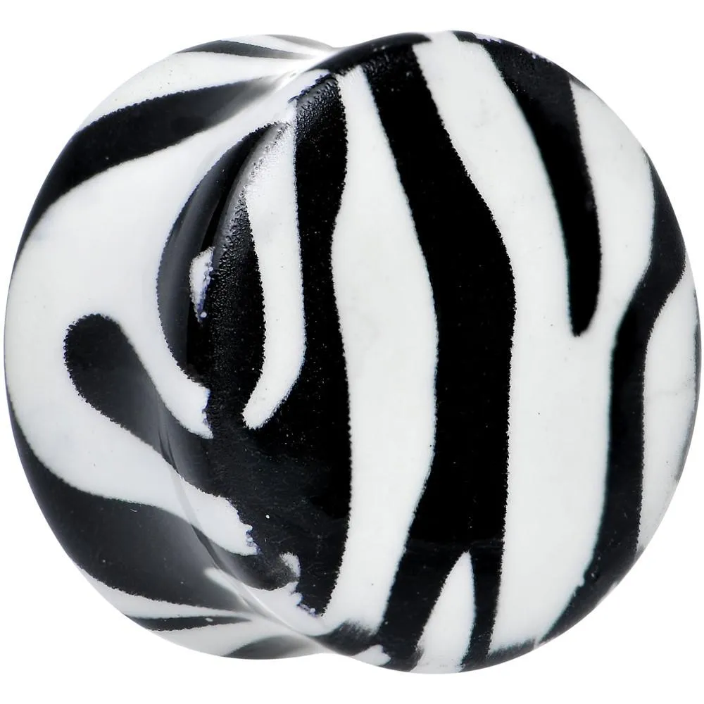 Zebra Print Glow in the Dark Saddle Plug 2 Gauge to 1 Inch